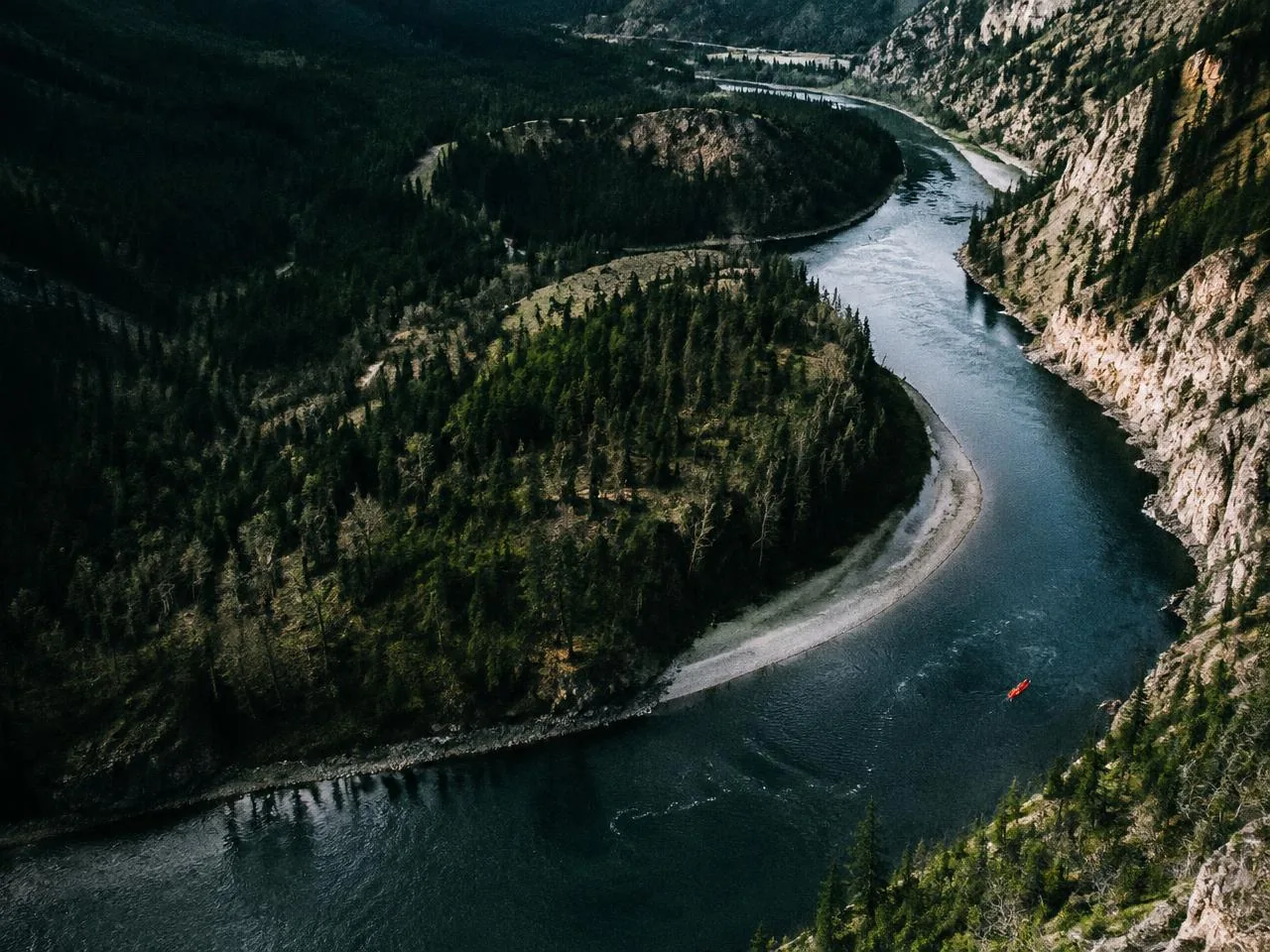 Aerial view of a winding river canyon